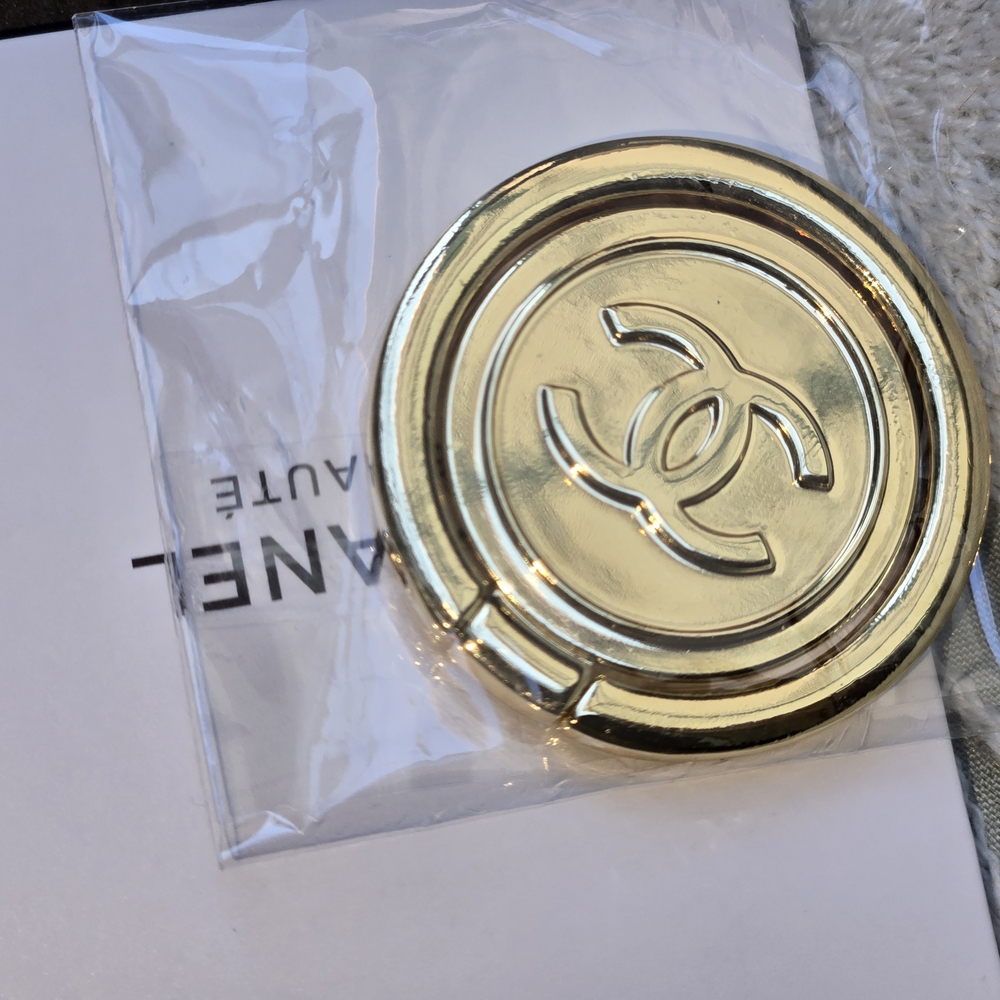 Chanel Gold Toned Pop Socket